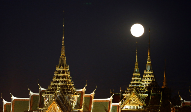 Moon rising over the Grand Palace in Bangkok, Thailand. Image: Sakchai Lalit/AP